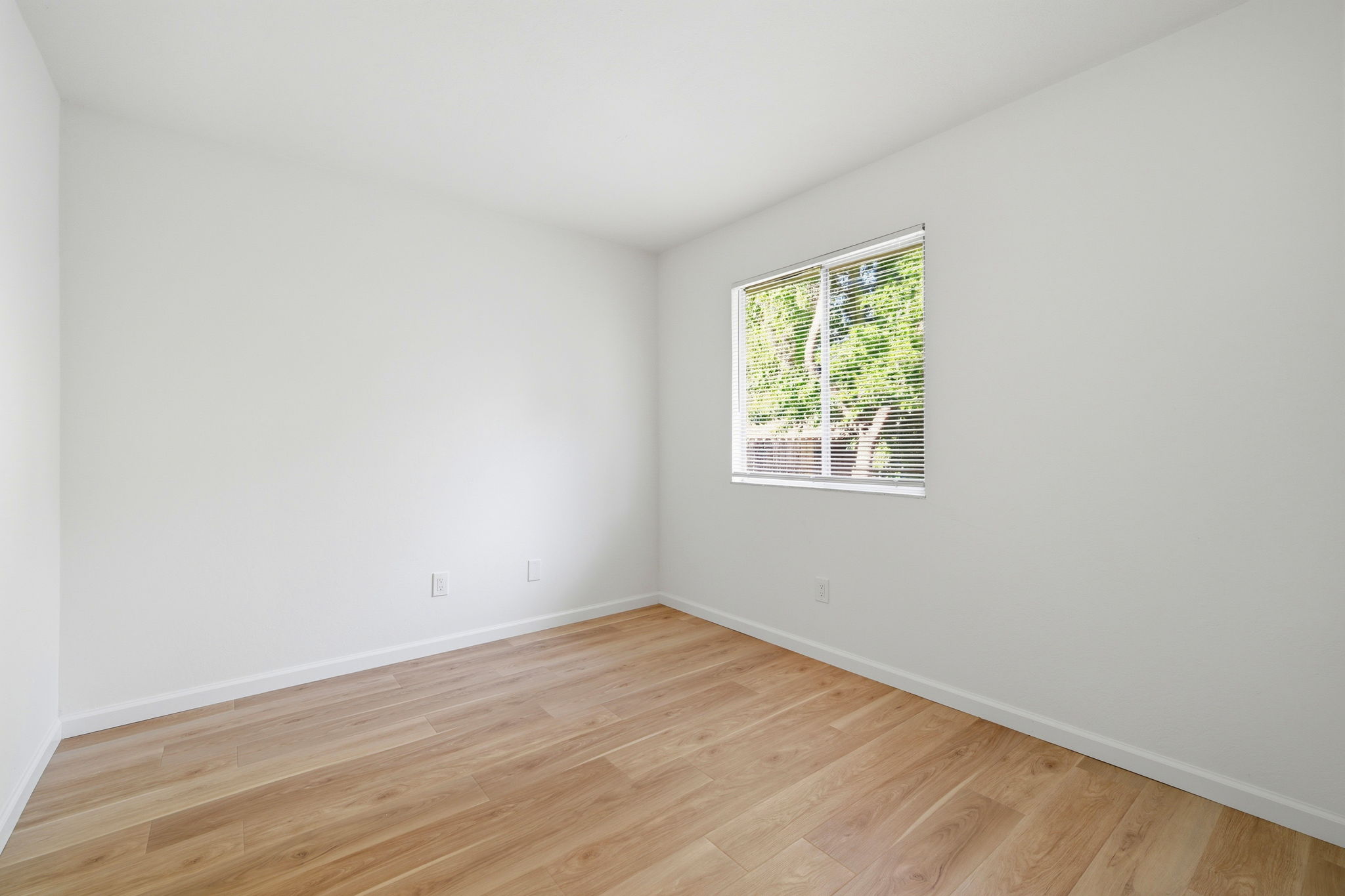 Bedroom with new flooring.